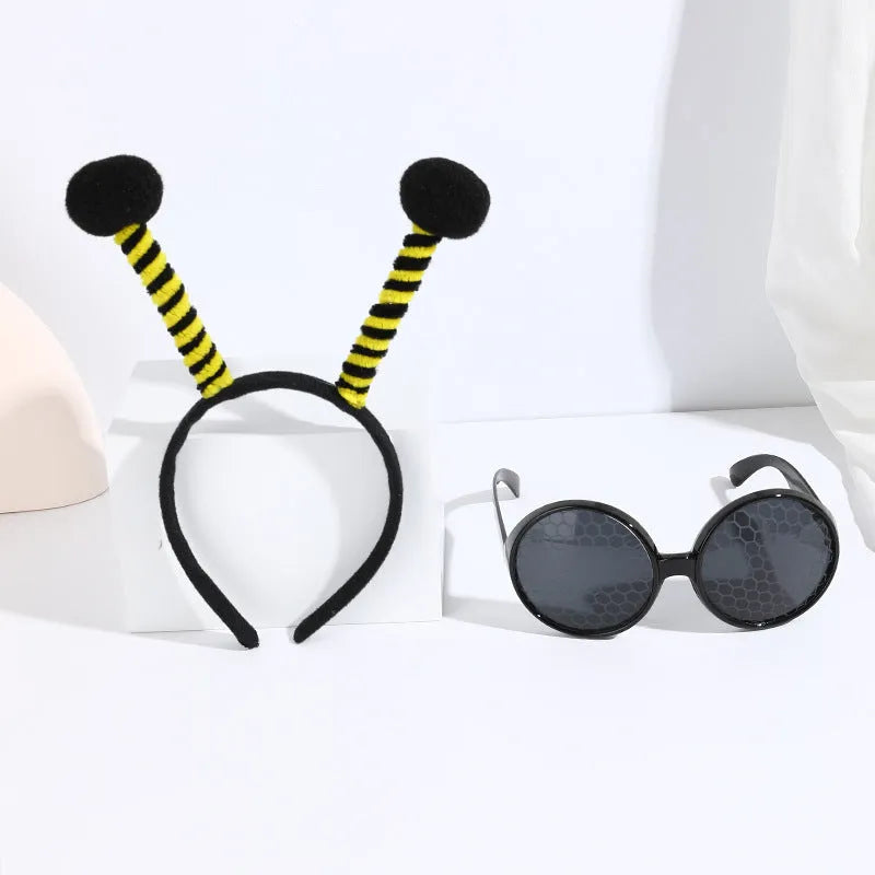 Yellow children's bee costume headband and matching bug-eye glasses for fancy dress parties.
