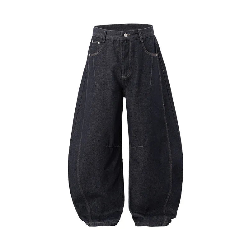 Men's wide leg denim trousers in original cow colour showing mid waist design and relaxed fit