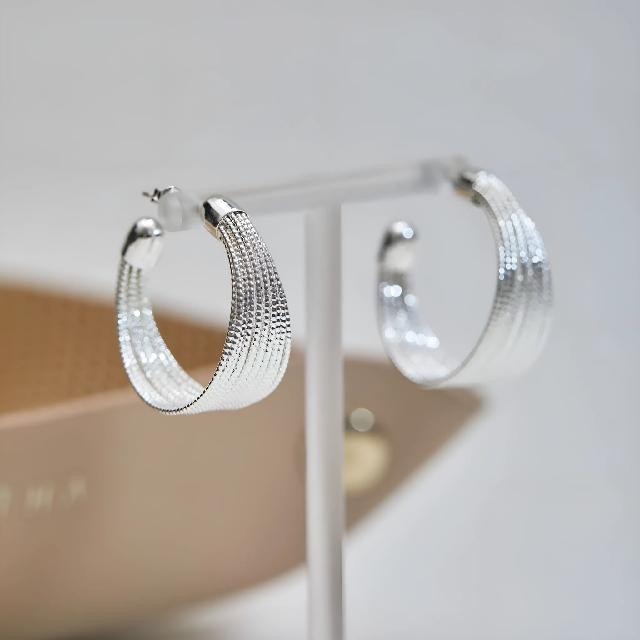 Geometric multi-layer bracelet earrings with copper construction and electroplated silver or gold finishes