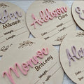 Square plywood name label with baby birth information, 15cm by 15cm, for nursery decoration.