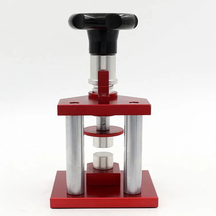 A watch back cover press tool with a spiral mechanism and a set of 20 plastic moulds for watch repair.