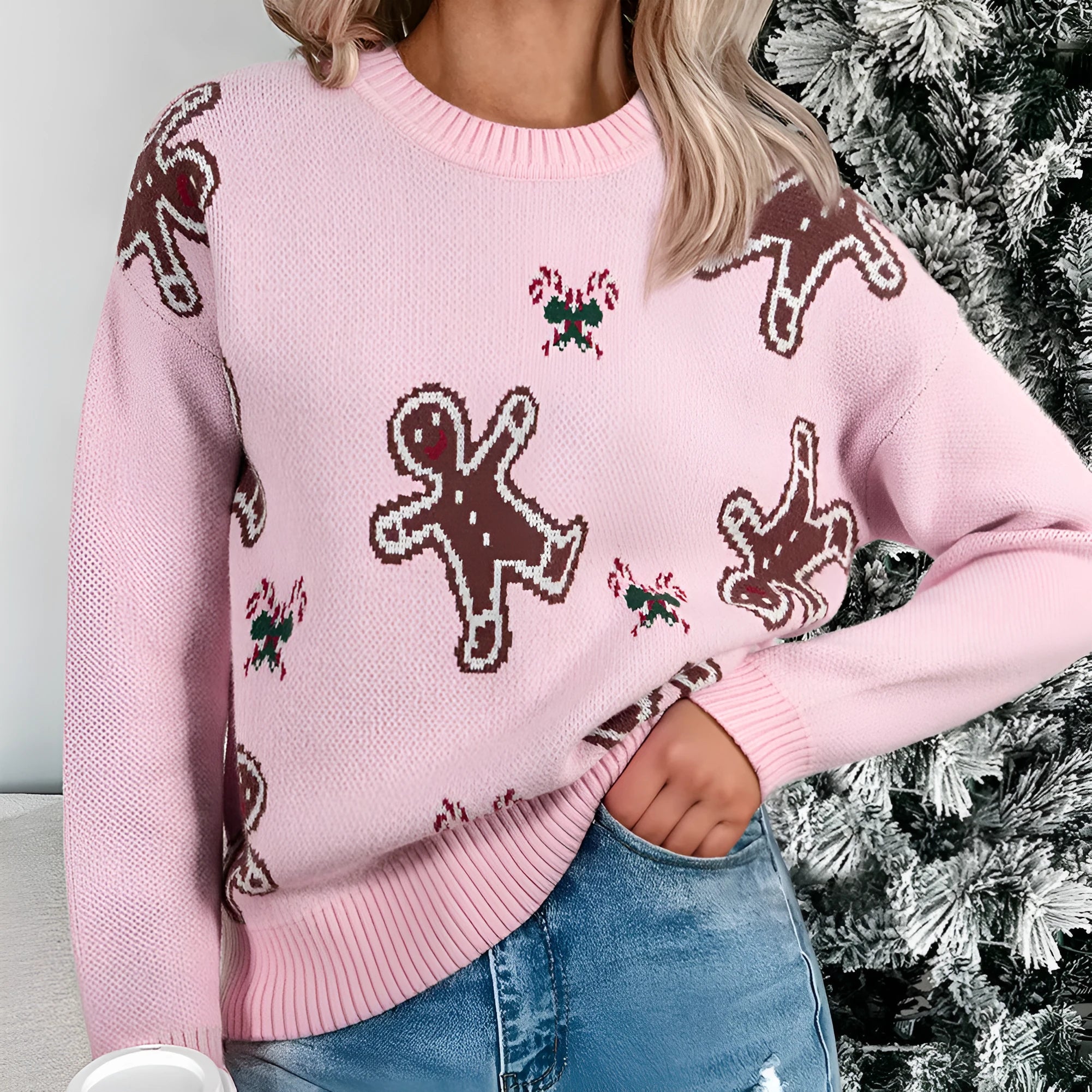 Women's spring round neck loose acrylic sweater in pink with long flight sleeves, shown on female model