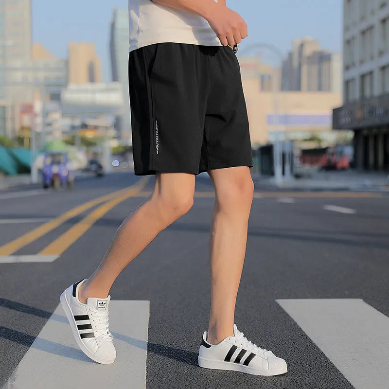 Men's quick-dry cotton five-point sports shorts in grey, black, and blue with elastic waist and drawstring, sizes L to 10XL