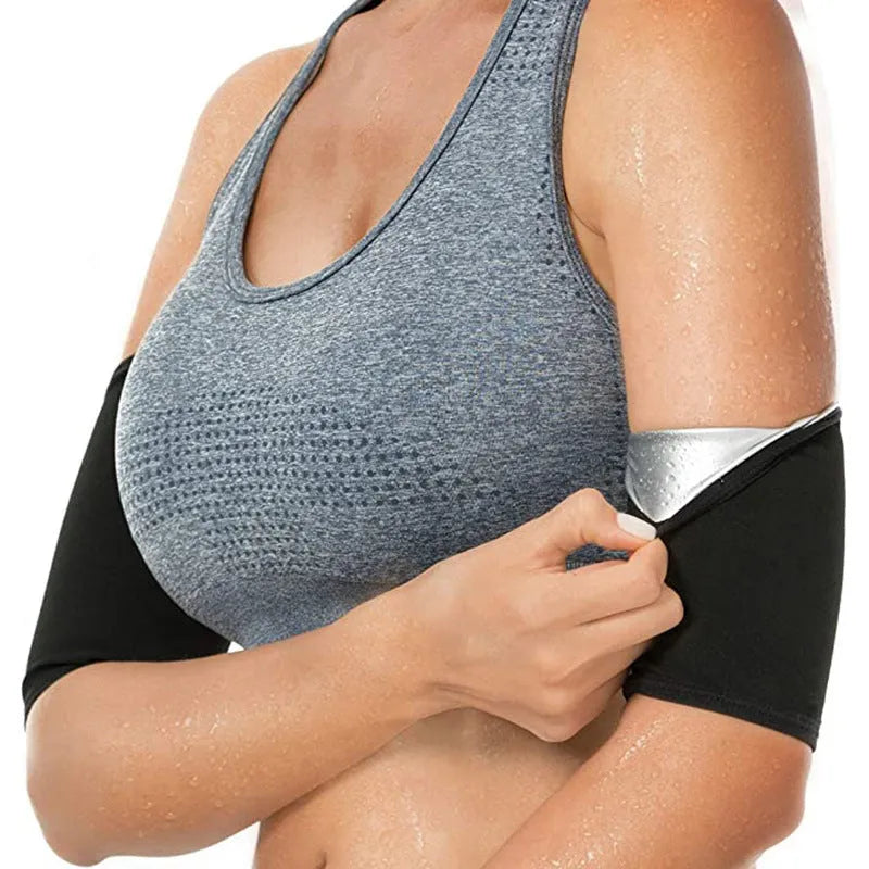 Compression sports arm sleeve in black and red colour, worn on forearm during workout.