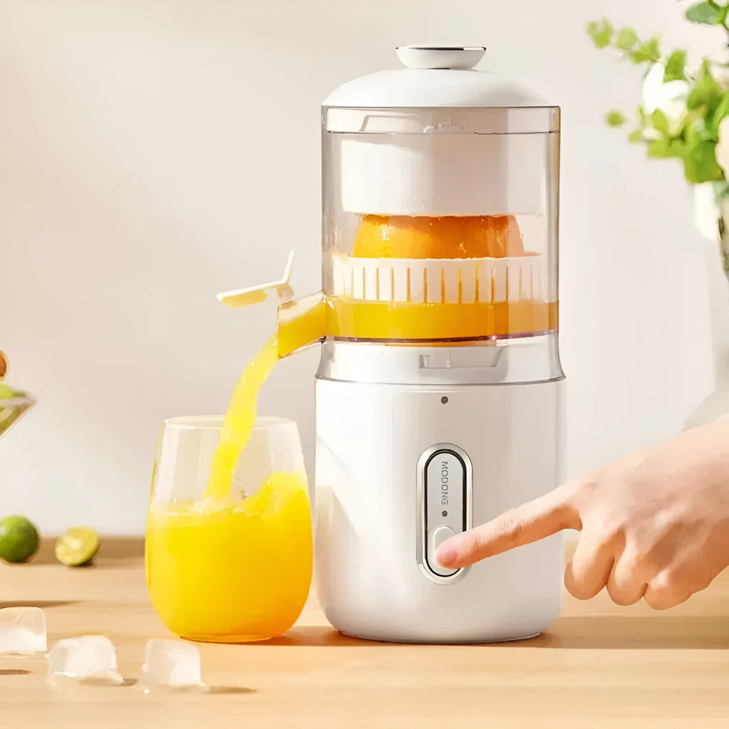 Green portable electric fruit juicer with USB-C charging and automatic pressing mechanism