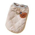 Quilted pet vest with bear patch embroidery on cream background for small dogs