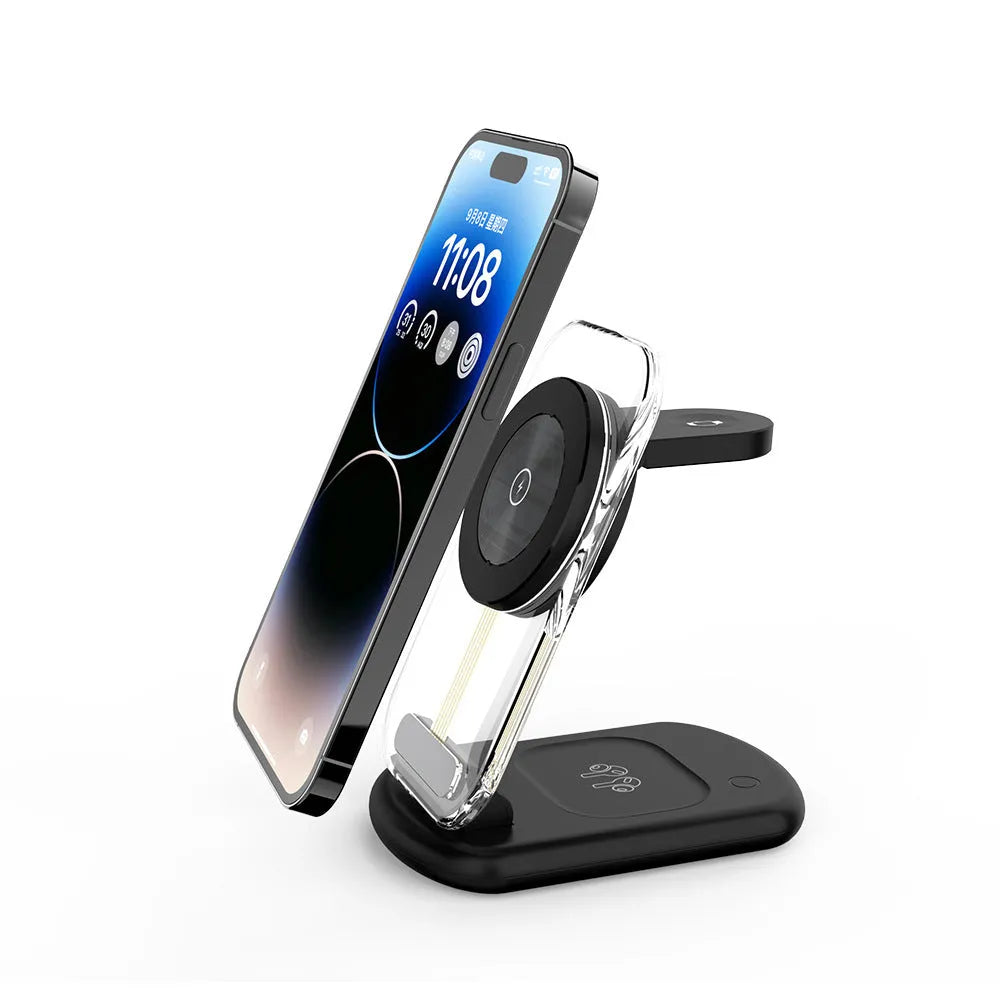 Transparent folding magnetic three-in-one wireless charger showing internal coil, in black, on a desk.
