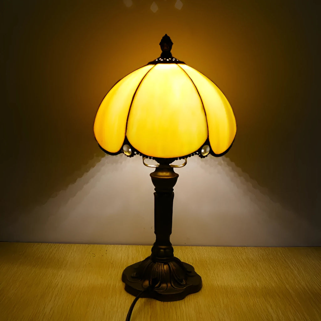 Beige bedside table lamp with simple modern design measuring 20cm wide