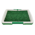 Green artificial grass dog toilet tray measuring 54cm by 38cm with three-layer construction