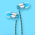 Black wired in-ear headphones with a 3.5mm plug, microphone on the cable, and silicone ear tips.