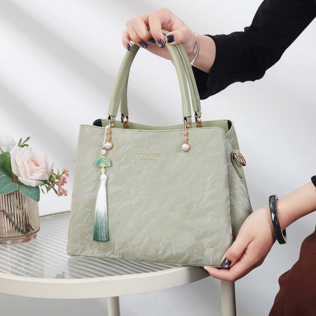 Women's PU shoulder bag in urban simplicity style with slit pocket and four colour options