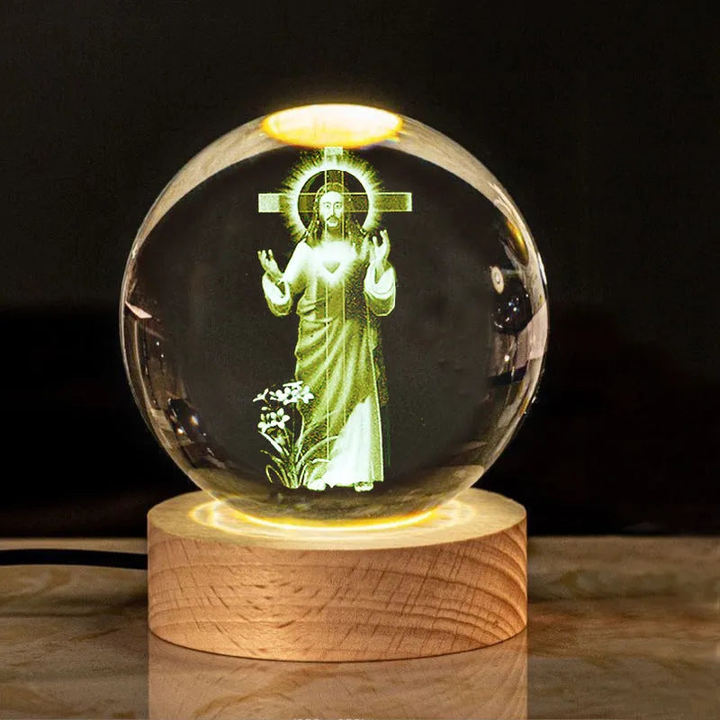 White crystal ball desk ornament on a wooden warm light base, showing purity-themed designs.
