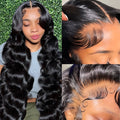 Black long curly synthetic wig with large waves, shown on a mannequin head