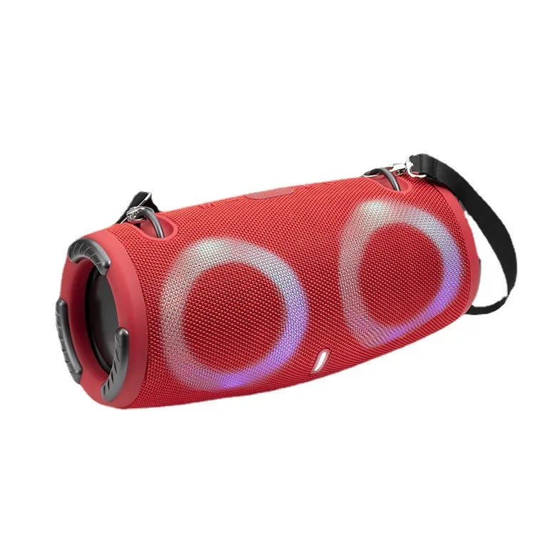 War Drum portable Bluetooth speaker with multi-colour RGB lights, showing carry strap and waterproof casing.