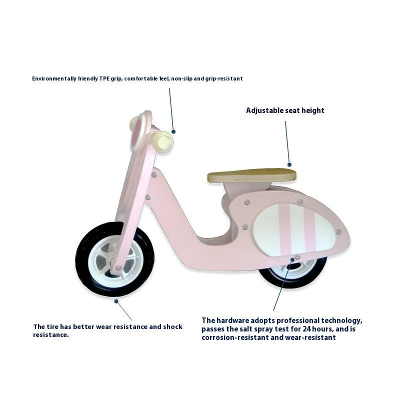Pink wooden balance scooter for toddlers with 10-inch wheels.