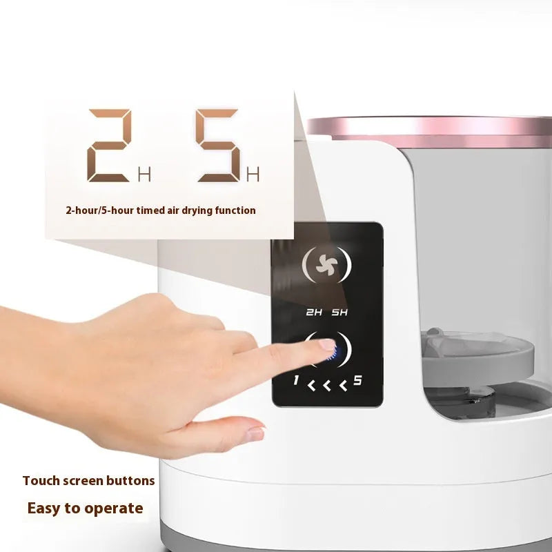 Automatic electric makeup brush cleaning device with drying chamber showing brushes in silicone cleaning bowl