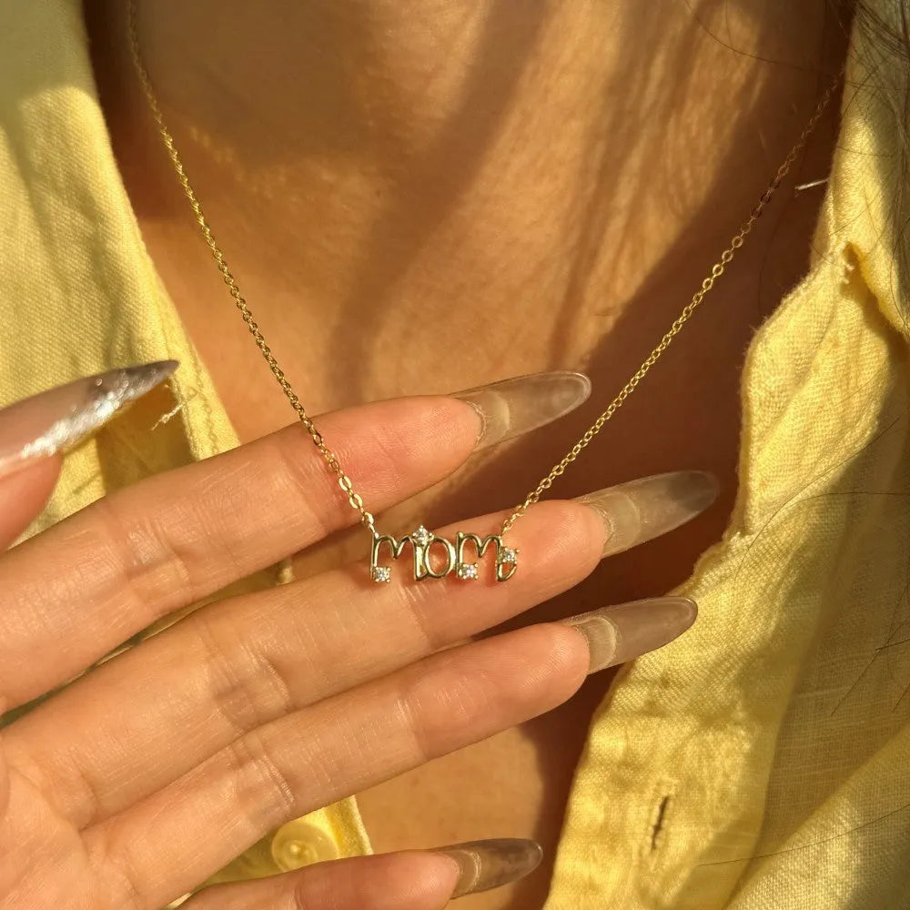 925 silver clavicle chain necklace with 15mm letter pendant in electroplated finish on display