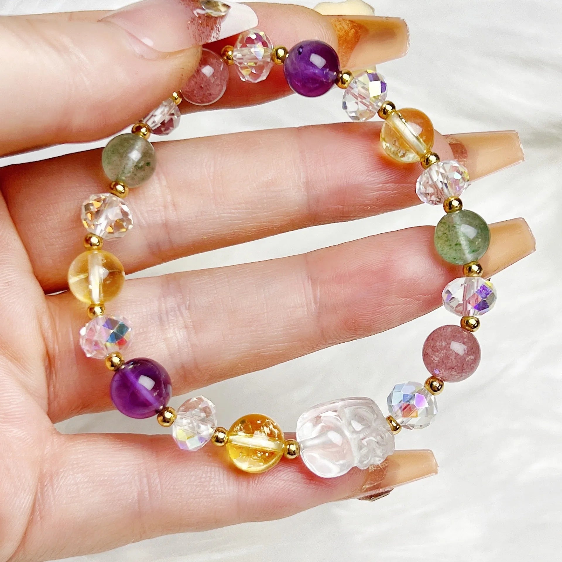 Handcrafted crystal bracelet featuring combined phoenix and nine-tail fox animal motifs