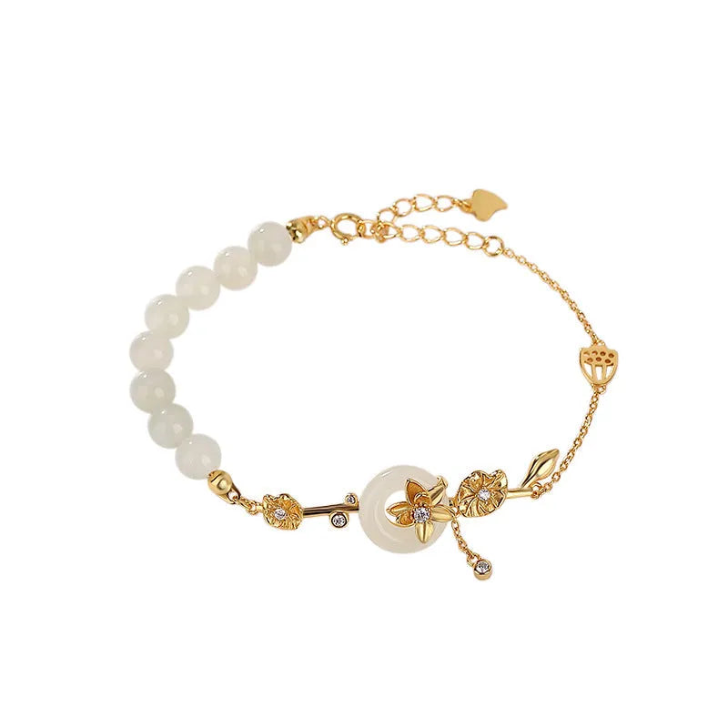 Women's retro bracelet with Hetian jade lotus peace buckle design in 925 silver