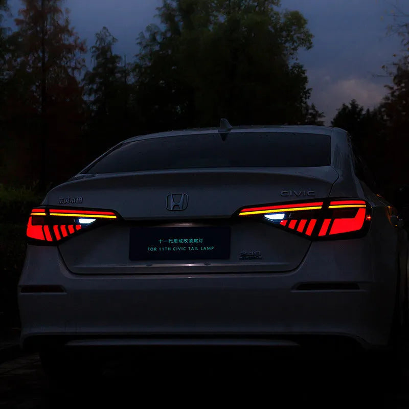Black and red LED tail light assembly for 11th generation Honda Civic with sequential turn signals.
