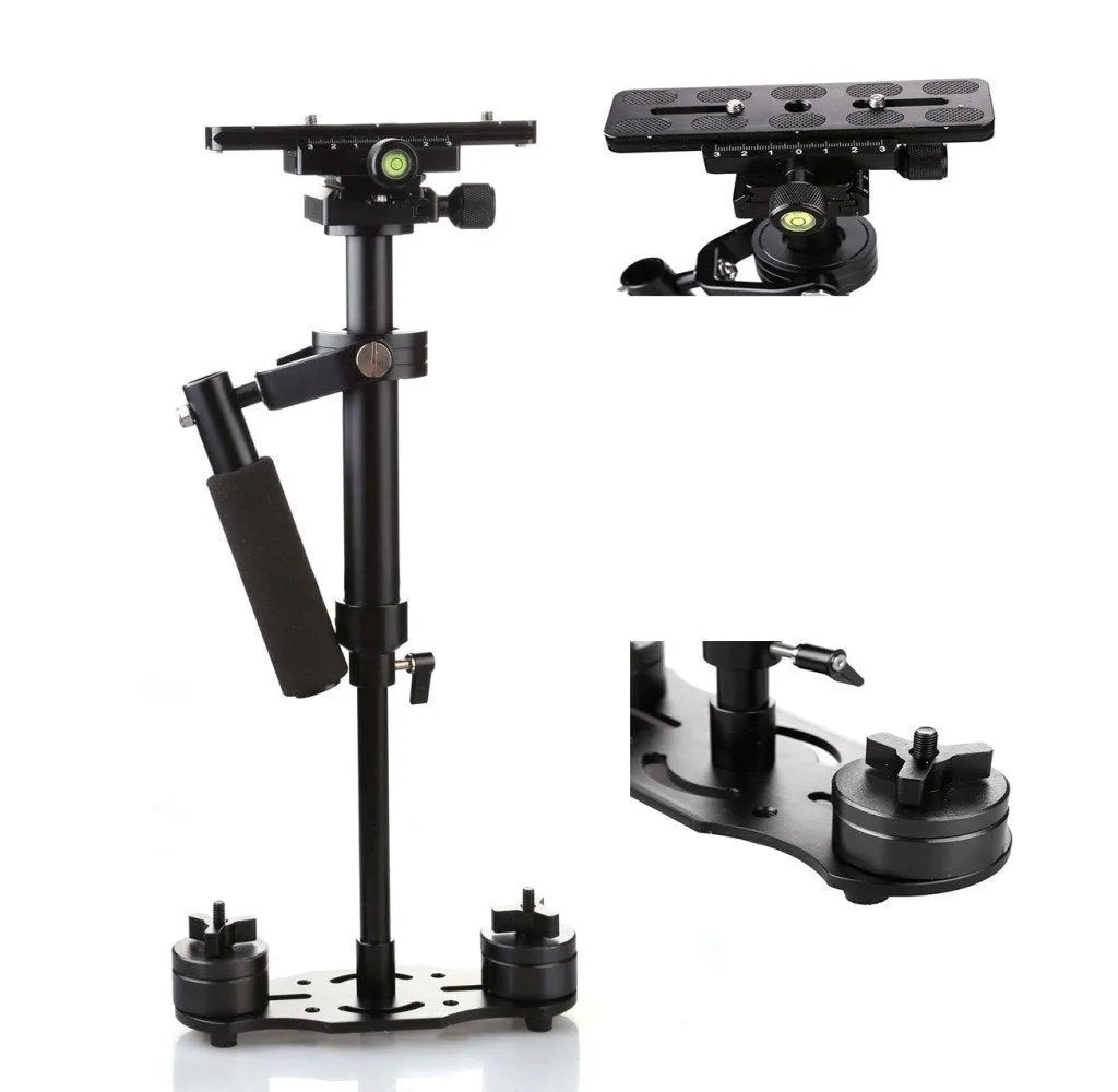 Black aluminium handheld camera stabiliser with adjustable height on a table.