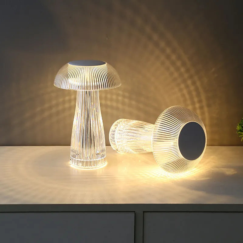 Creative crystal acrylic jellyfish table lamp with touch control and colour options on a desk