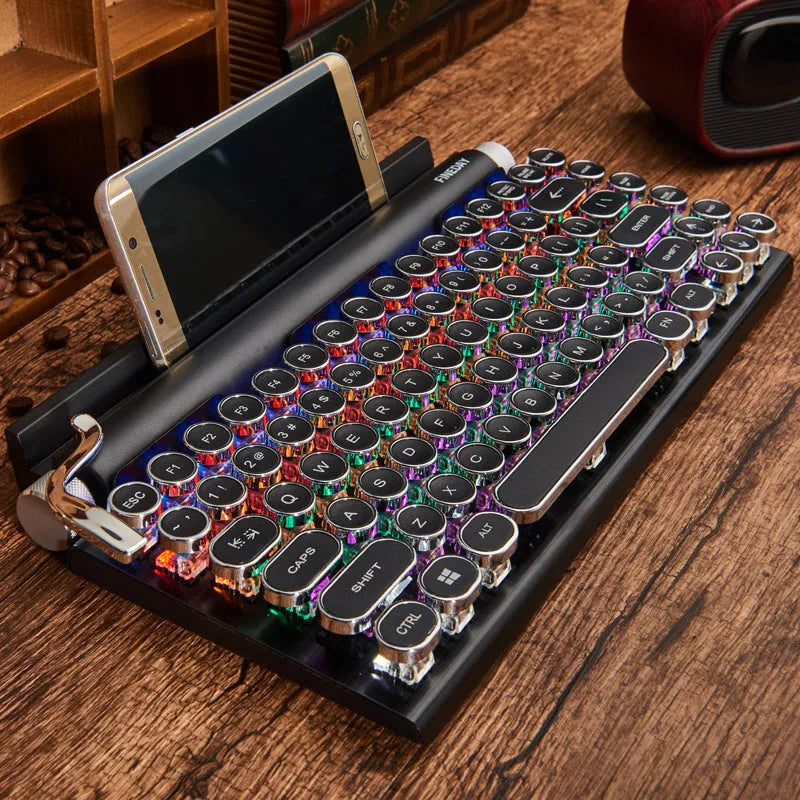 Black dot retro mechanical keyboard with backlit keys on a metal chassis