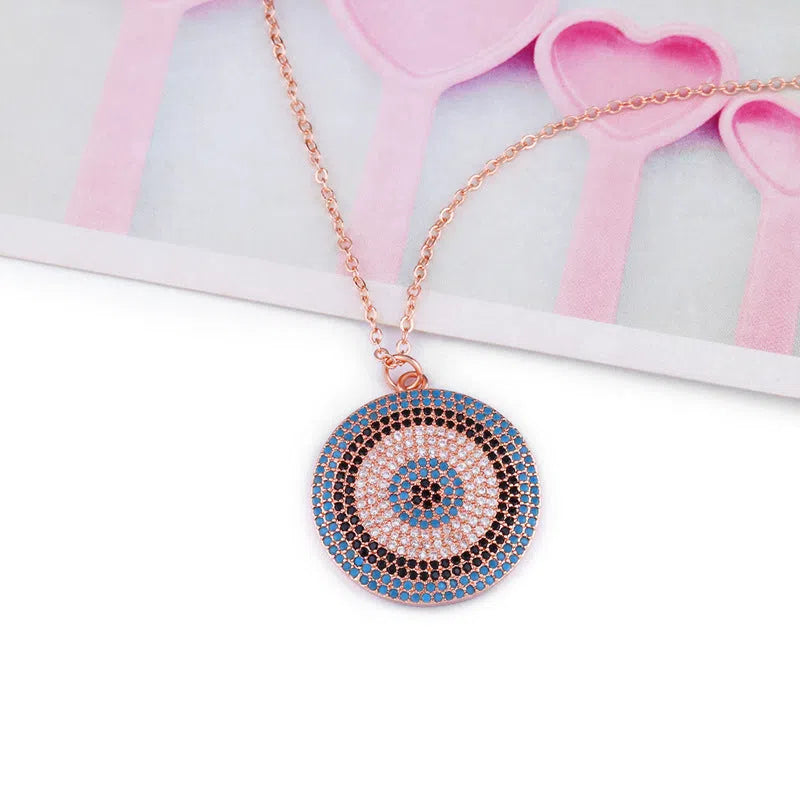 18K gold plated copper clavicle chain necklace with zircon pendant on display, gold finish, snake bone chain