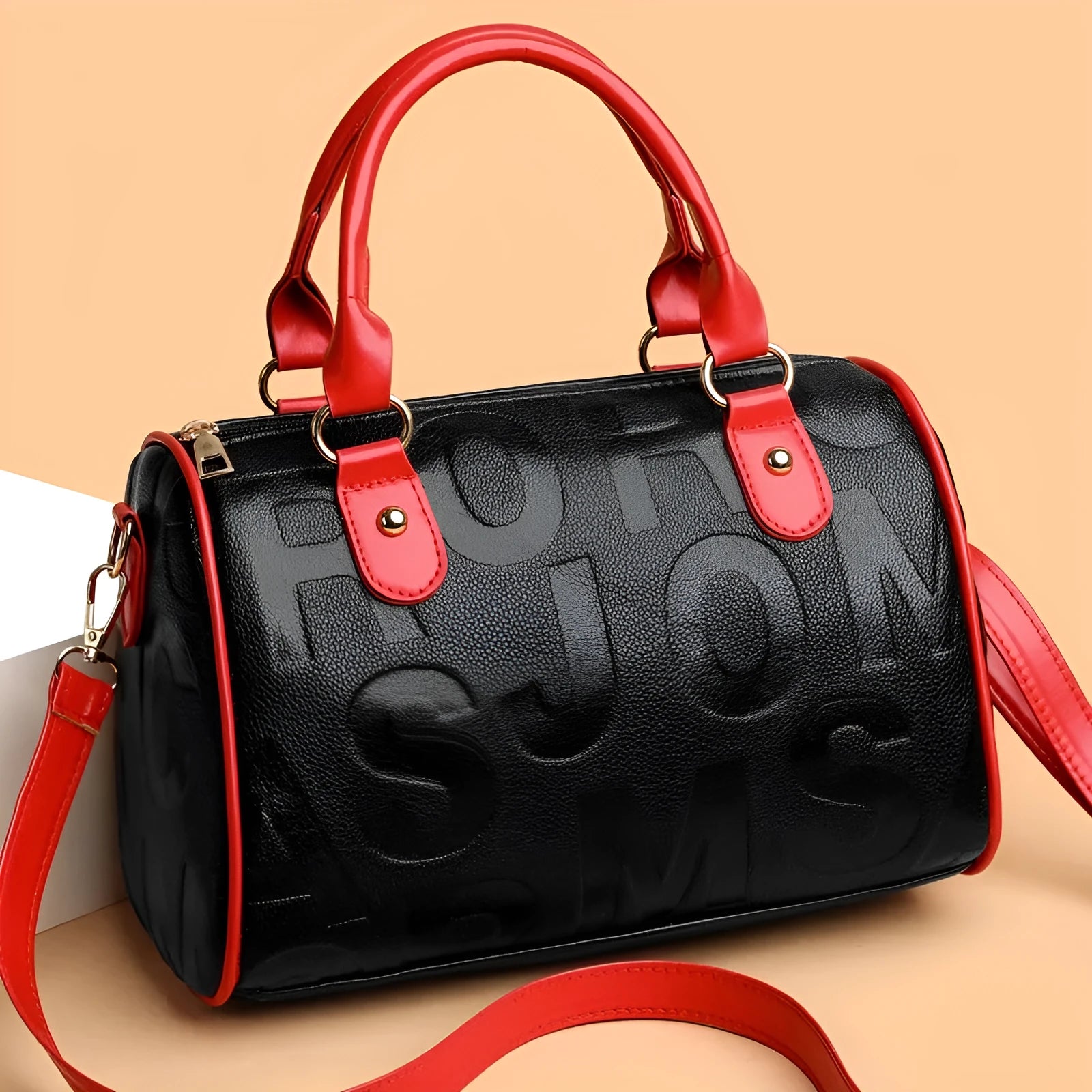 Cylindrical crossbody bag in brown PU leather with three shoulder straps showing textured exterior