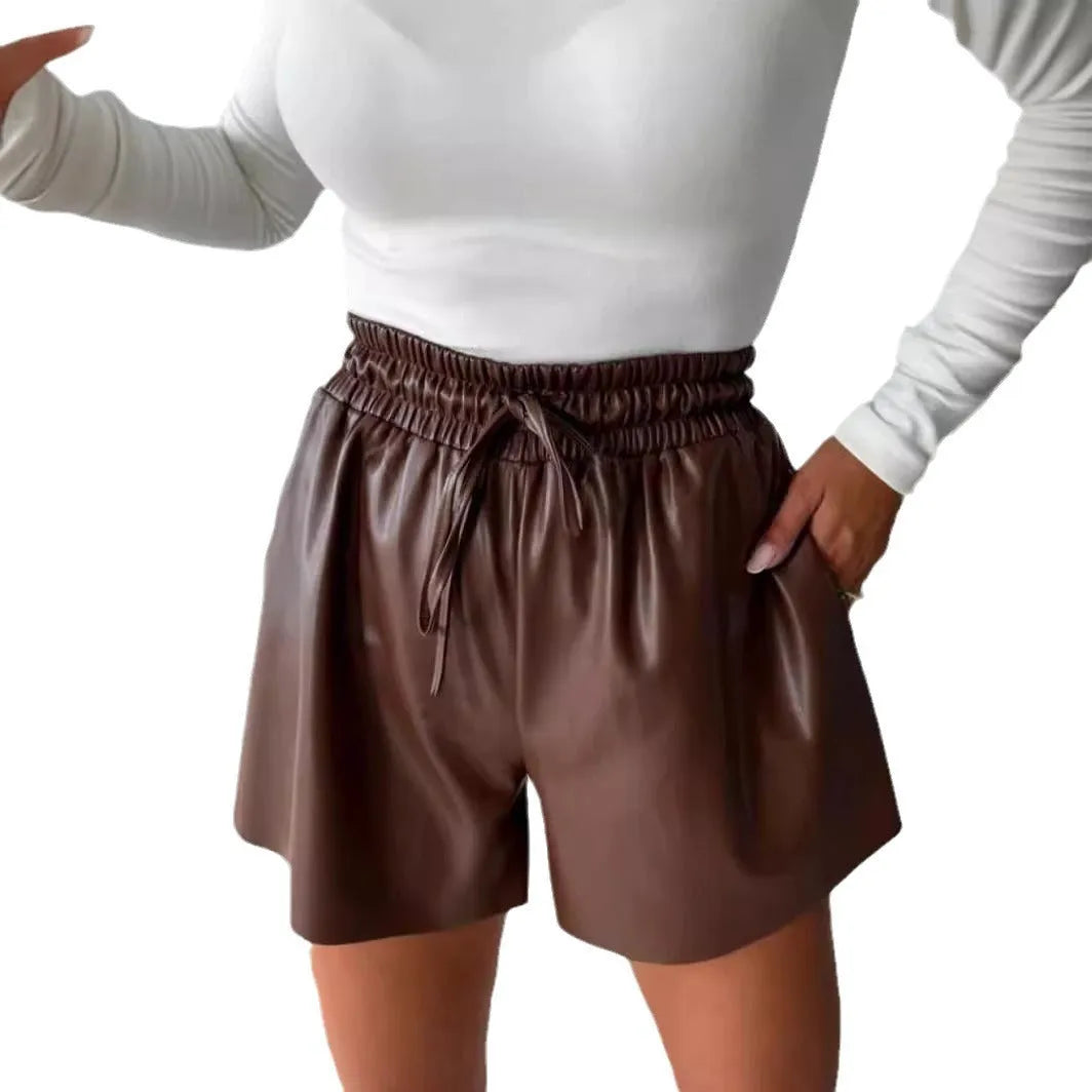 Women's black lace-up drawstring PU leather wide-leg casual shorts showing front detail
