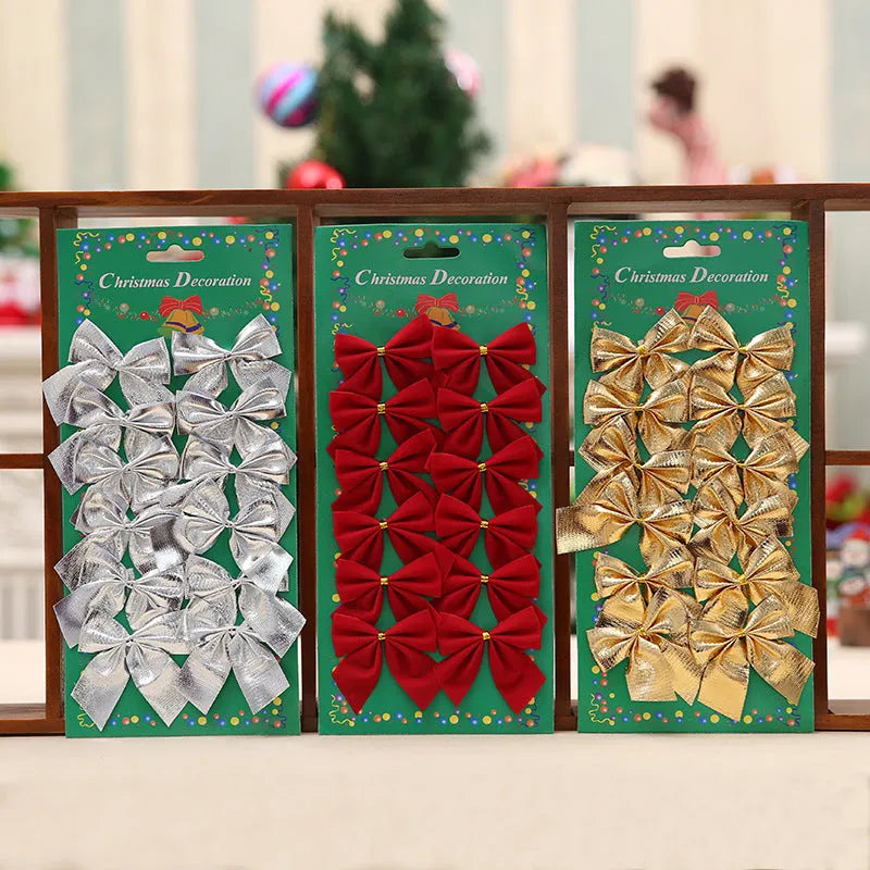 Red, gold, red gold, and silver 5 cm polyester Christmas decoration bows on a tree branch