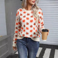 Beige maple leaf Christmas loose fit sweater with contrast colour detailing