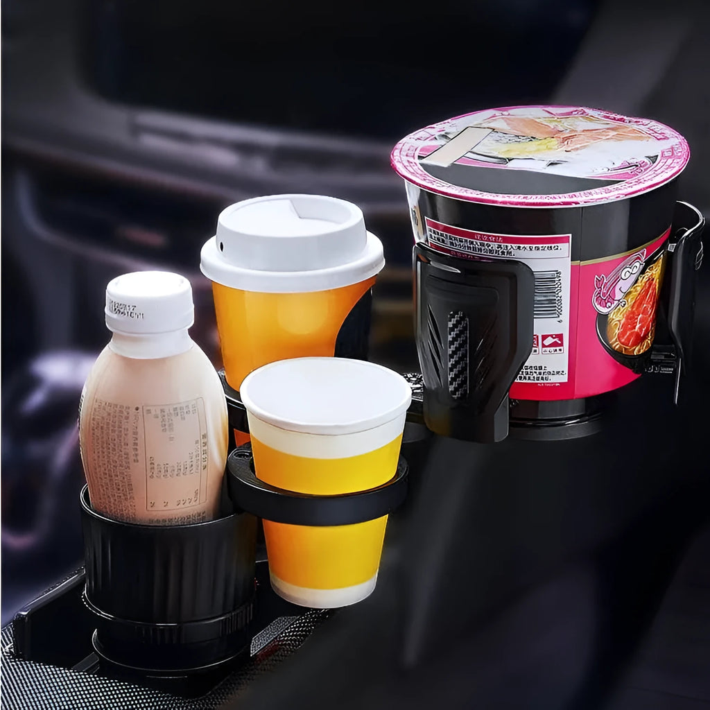 Black carbon fibre finish car cup holder with retractable adjustable base for drink bottles.