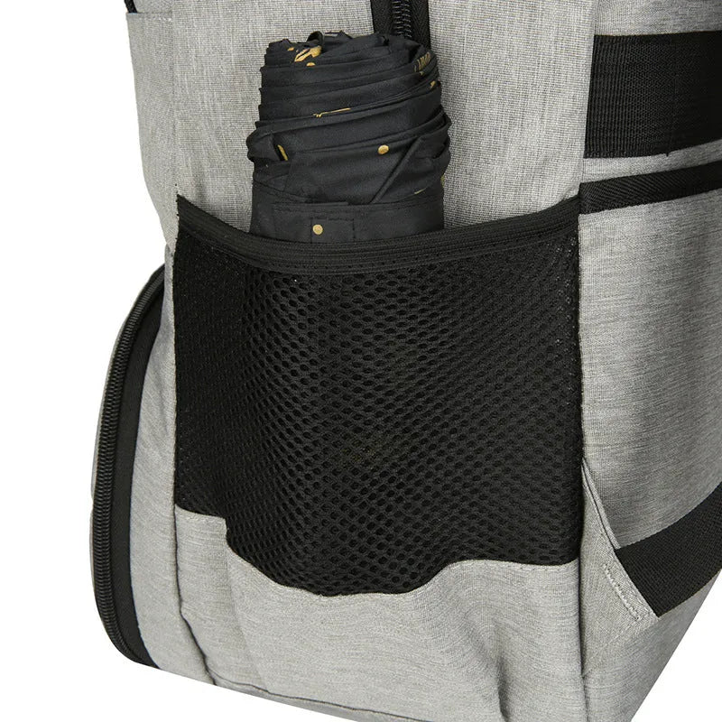 Light grey insulated Oxford cloth backpack with curved shoulder straps, shown with its pull rod belt accessory.