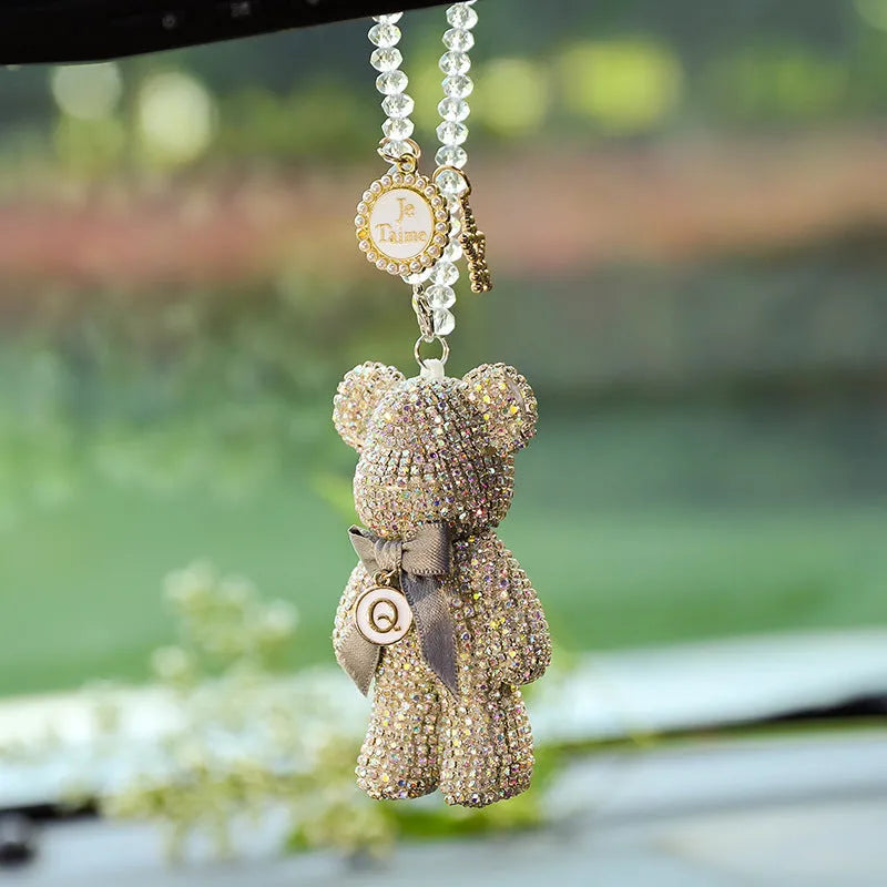 Violent Bear character car rearview mirror pendant with sparkling rhinestones on a black background.