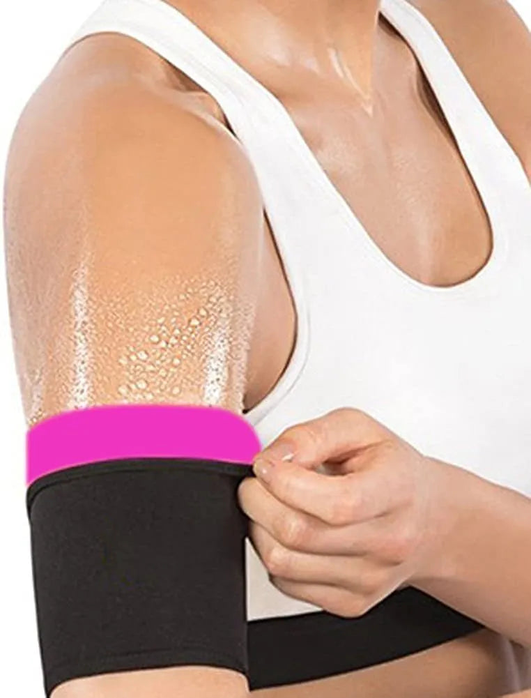 Compression sports arm sleeve in black and red colour, worn on forearm during workout.