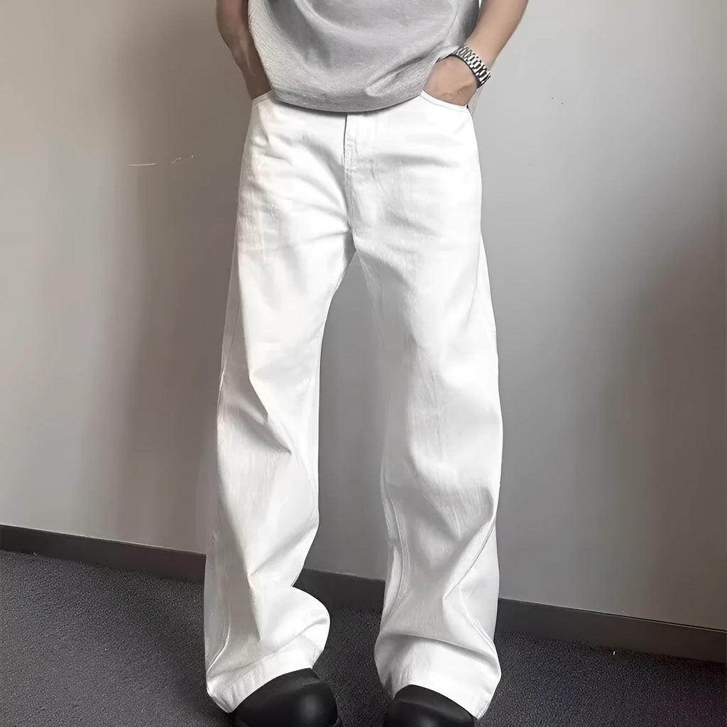 Men's white straight-leg cotton denim jeans on a neutral background.
