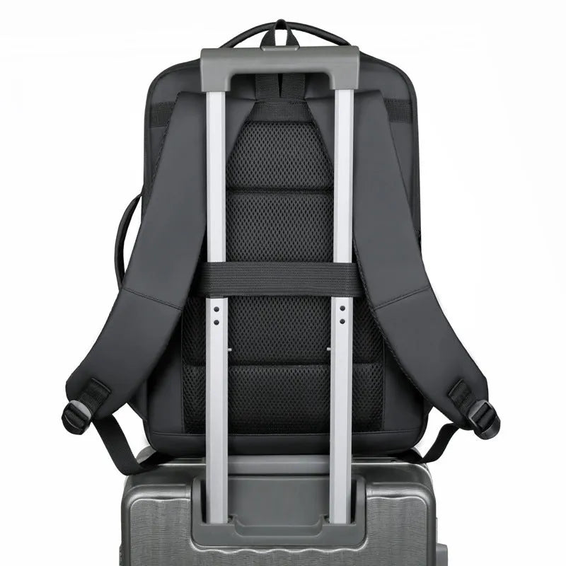 Large black waterproof backpack with curved shoulder straps for business travel and commuting