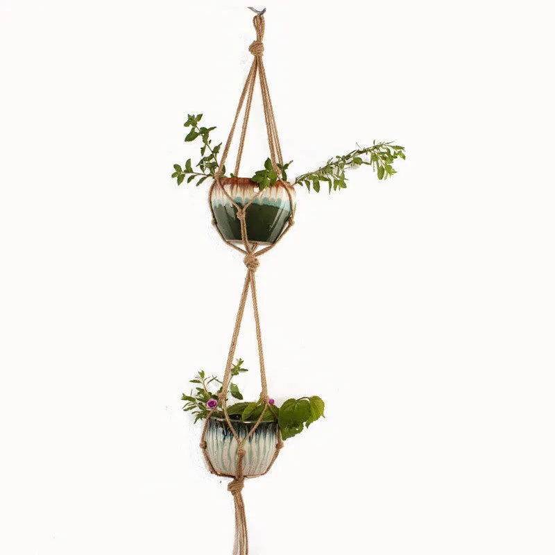 Woven cotton rope macrame plant hanger in a village style, shown as a desktop and wall-mounted planter.