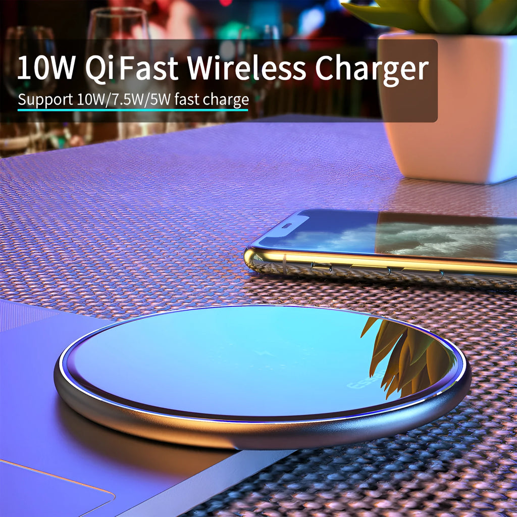 Black aluminium alloy 15W Qi wireless charging pad on a table with LED light.