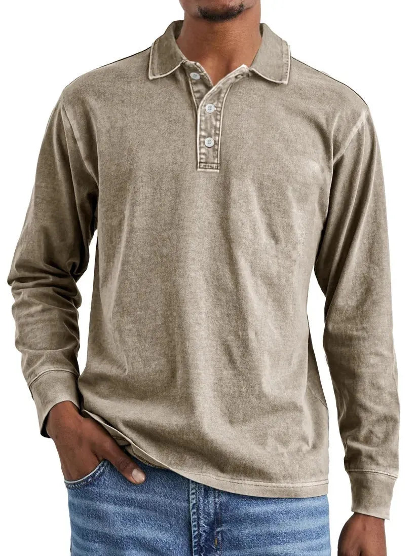 Man wearing a retro washed army green long sleeve polo shirt with a distressed lapel.