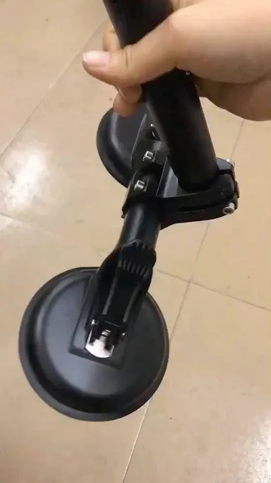 Black off-road car windscreen sucker base with a round glass suction cup and heavy rubber disc.