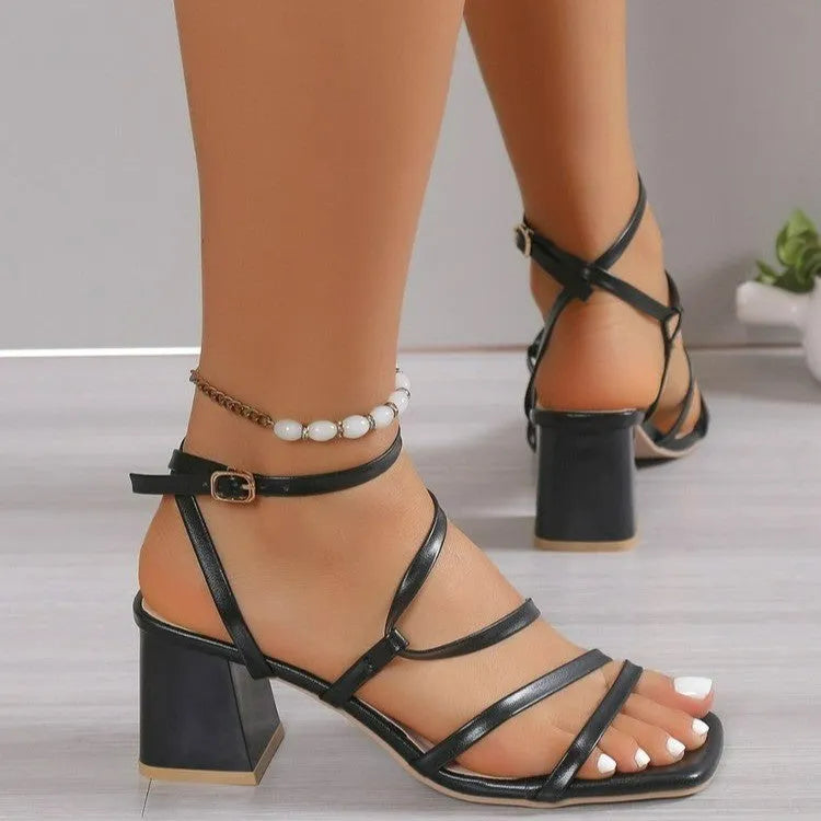 Women's plus size square toe slide sandals with an ankle buckle strap in beige.