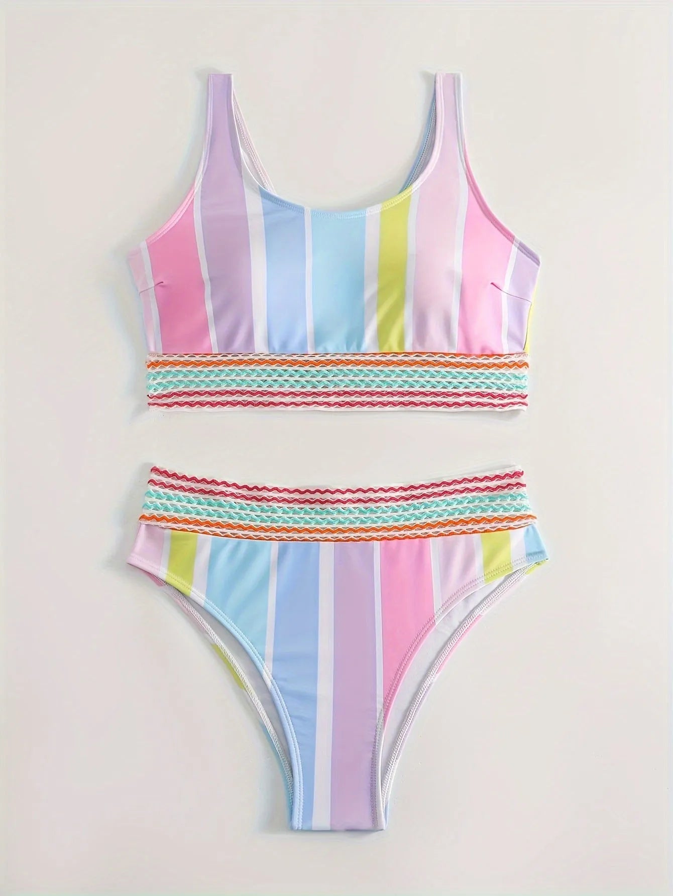 Women's striped two-piece sports bikini set in picture colour, shown for swimming.