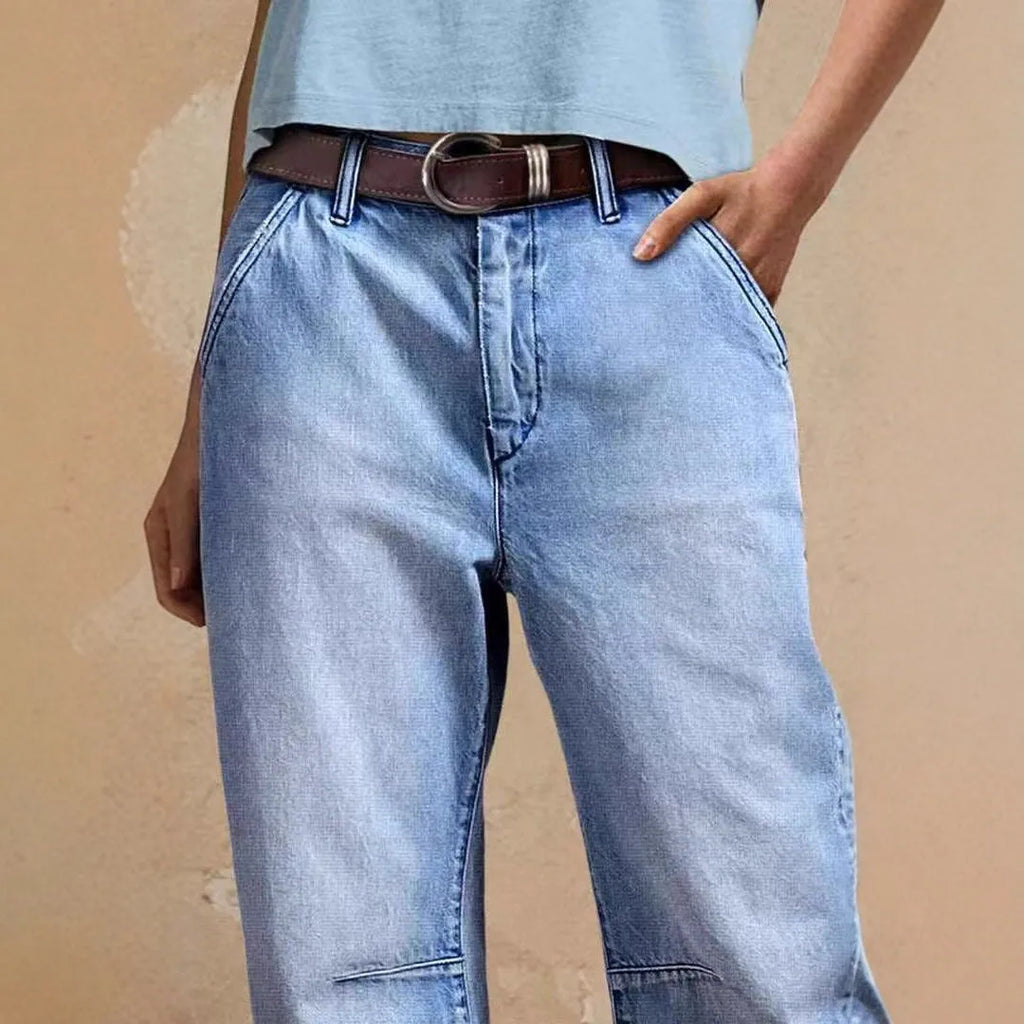 Casual loose jeans trousers in light blue denim with washed finish