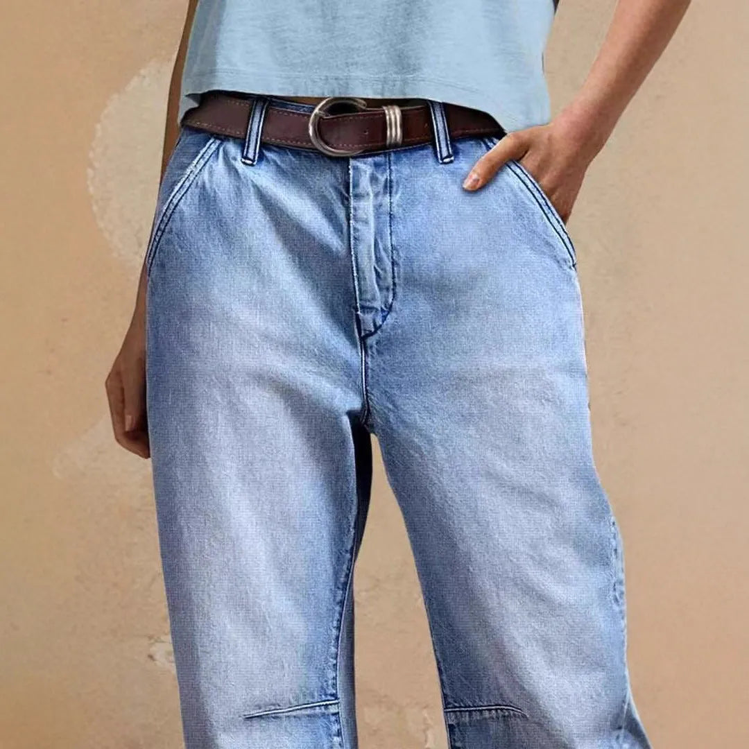 Casual loose jeans trousers in light blue denim with washed finish