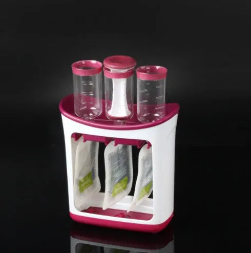Baby food maker squeeze station pressing homemade fruit puree into 4oz pouch on countertop