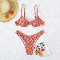 Red floral high-waisted women's one-piece swimsuit with side splits.