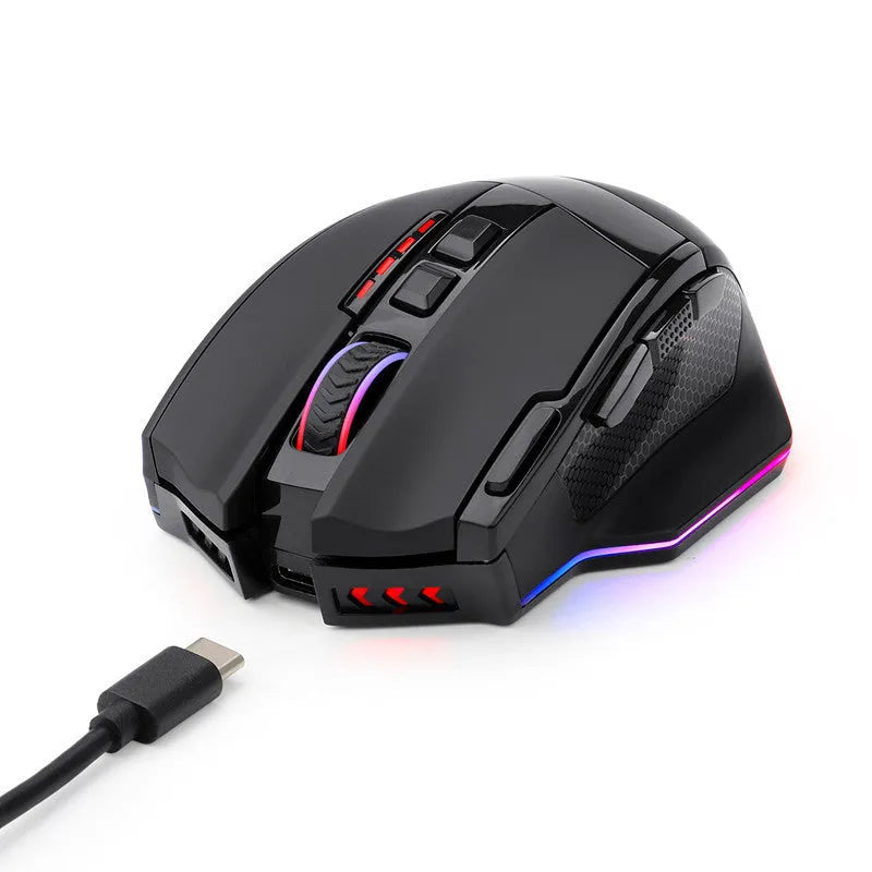 Black Redragon M801P dual-mode gaming mouse with multiple side buttons on a desk