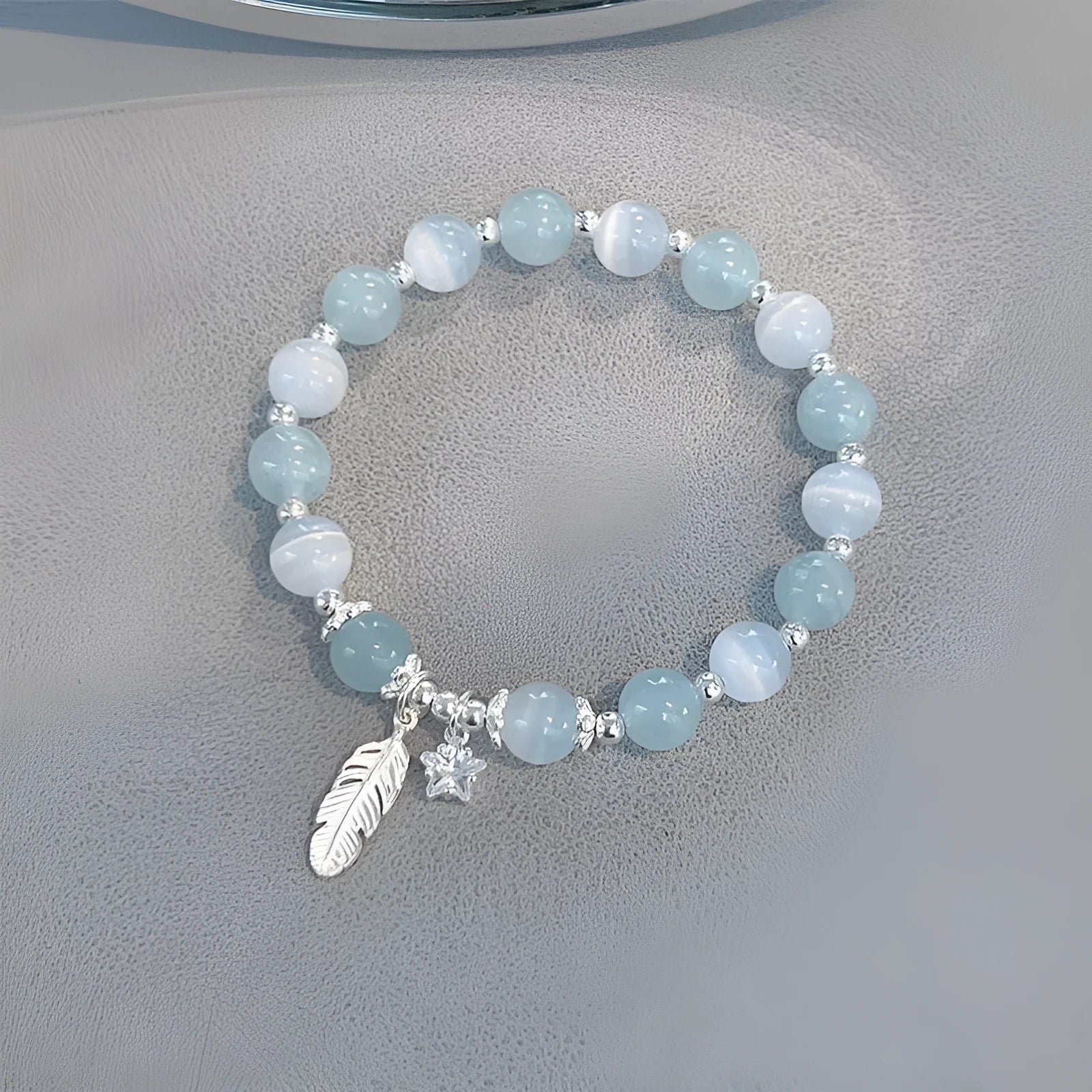 Small white crystal bracelet with blue moonlight colour and star design, Korean-style glass jewellery.